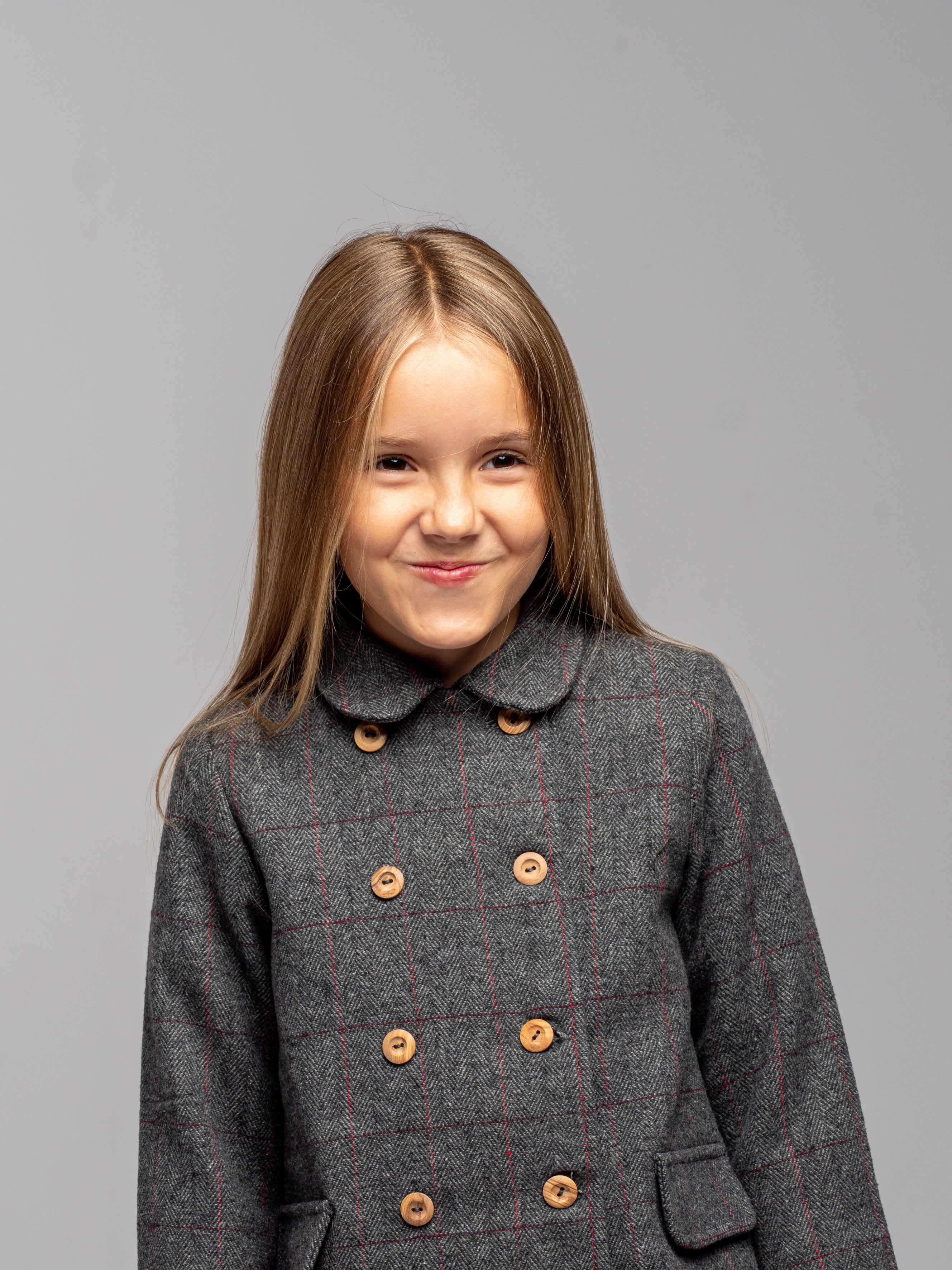 Manteau à carreaux gris