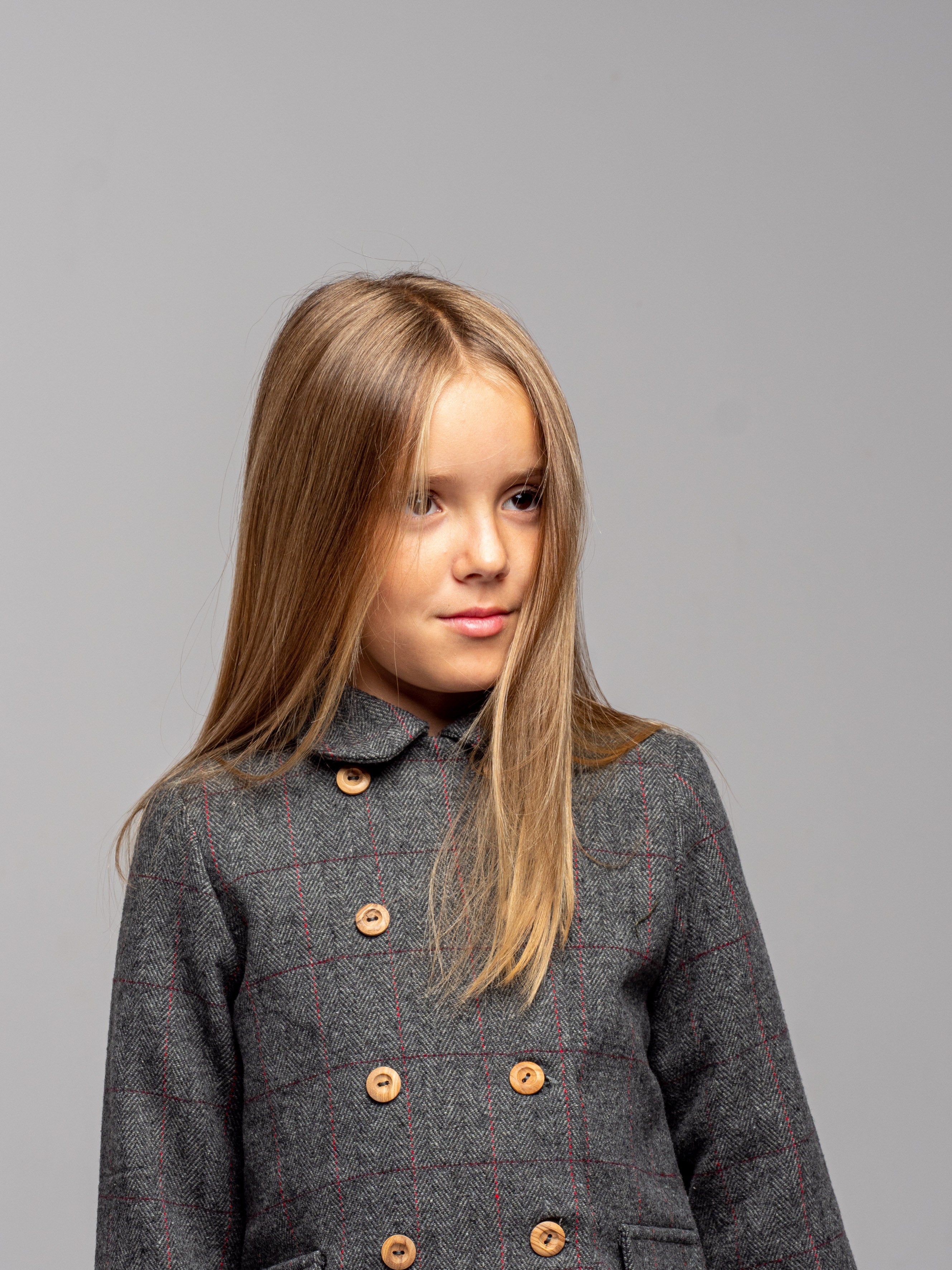 Manteau à carreaux gris