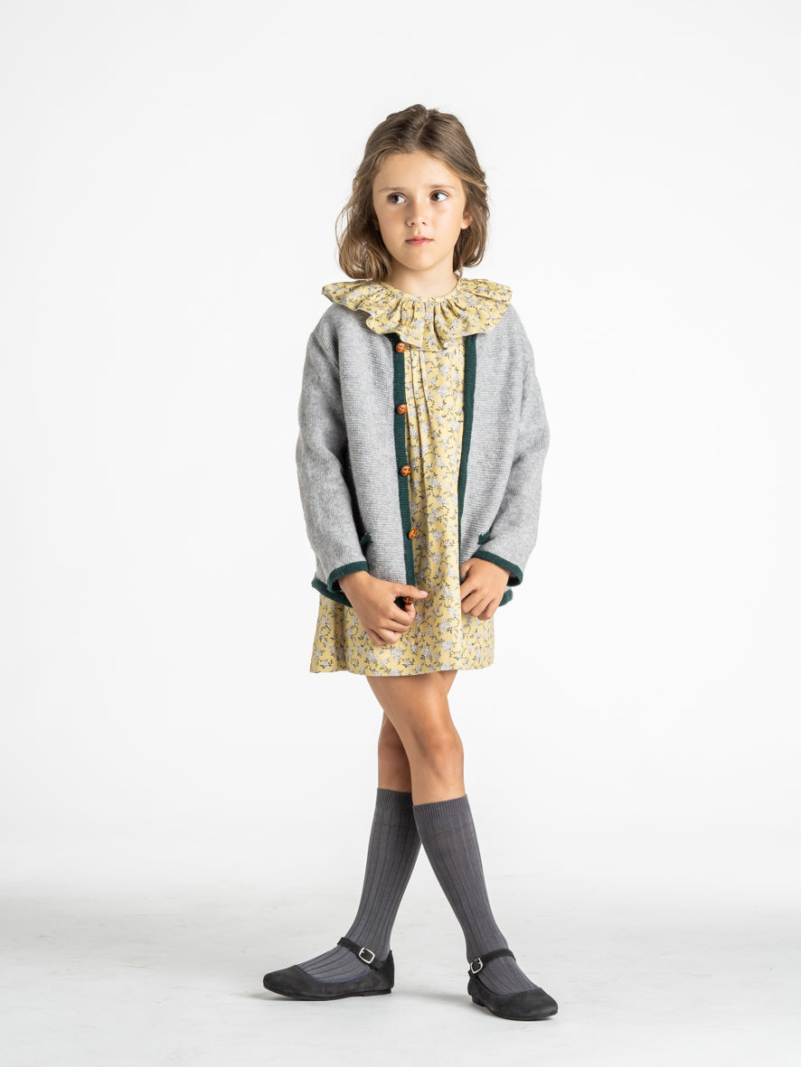 Veste en maille à bordure verte