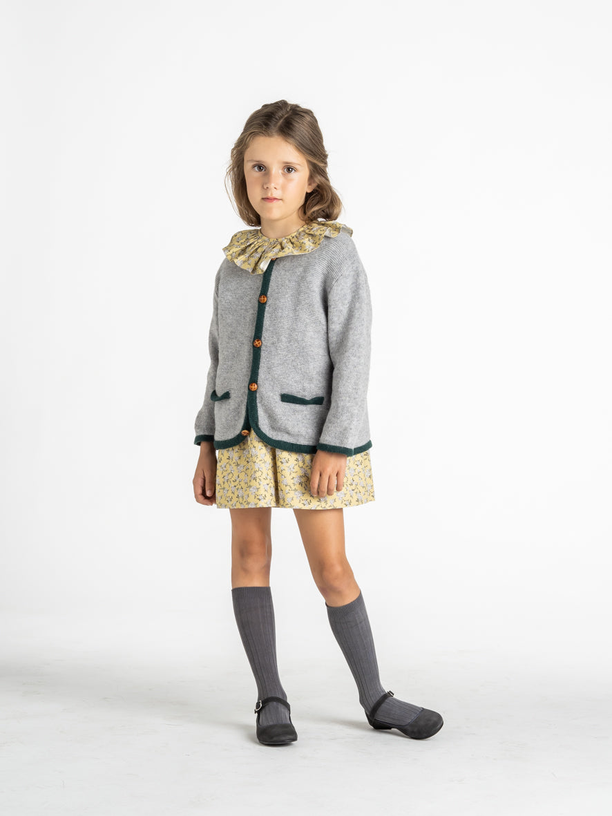 Veste en maille à bordure verte