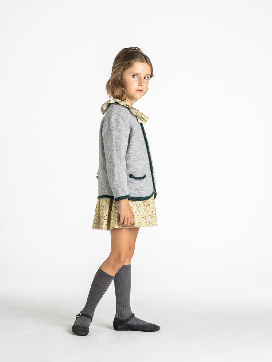 Veste en maille à bordure verte